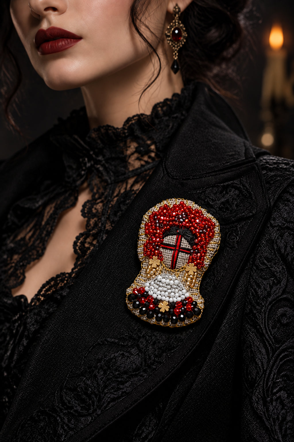 Ukrainian Motanka statement brooch worn on a jacket