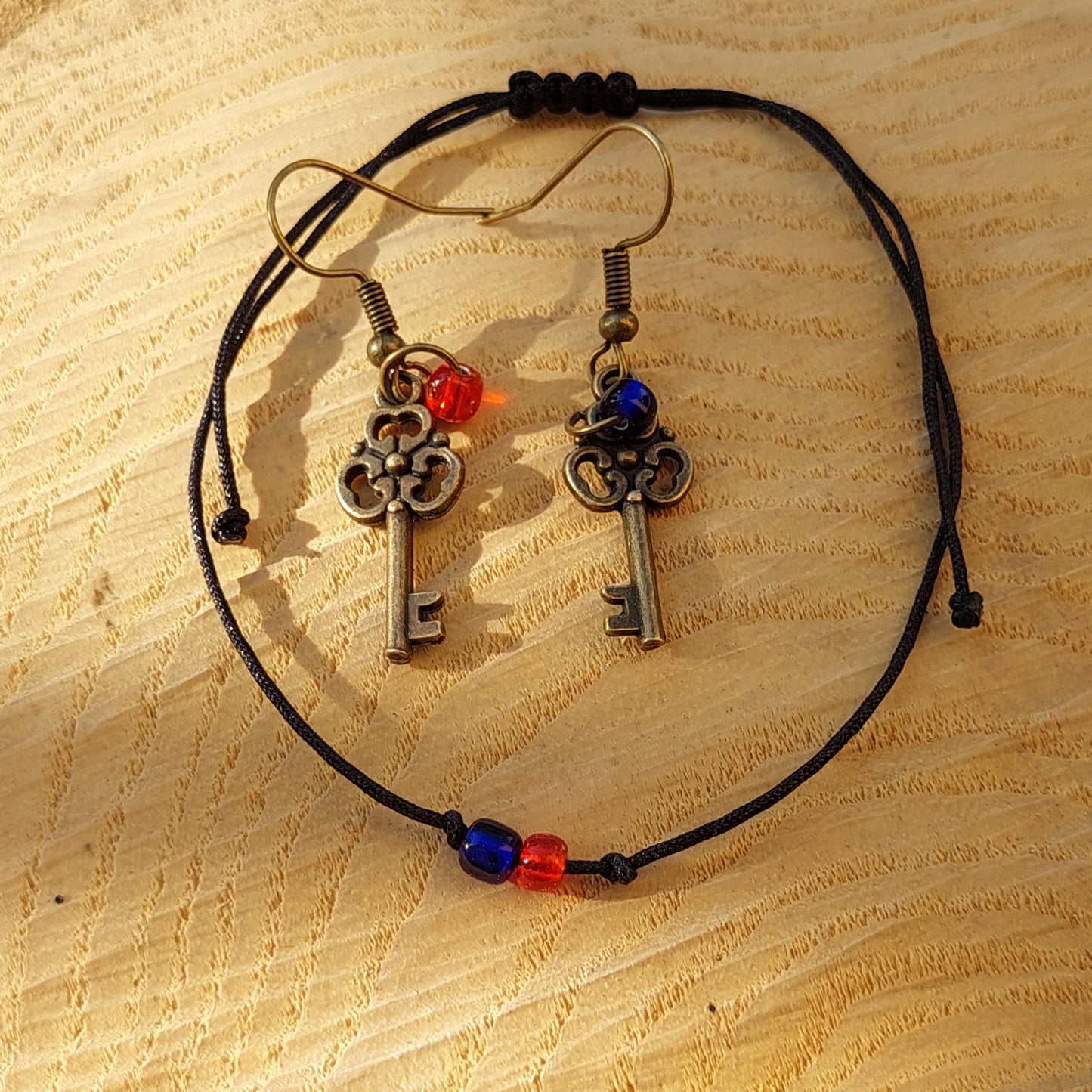 Matrix Choice Schmuckset – Ohrringe und Armband mit symbolischem Design