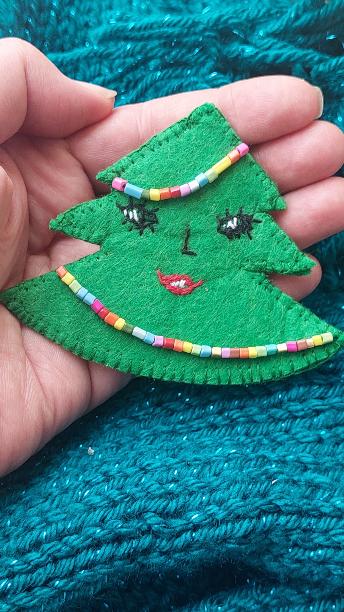 Handmade felt Christmas tree brooch with colorful beads and embroidery