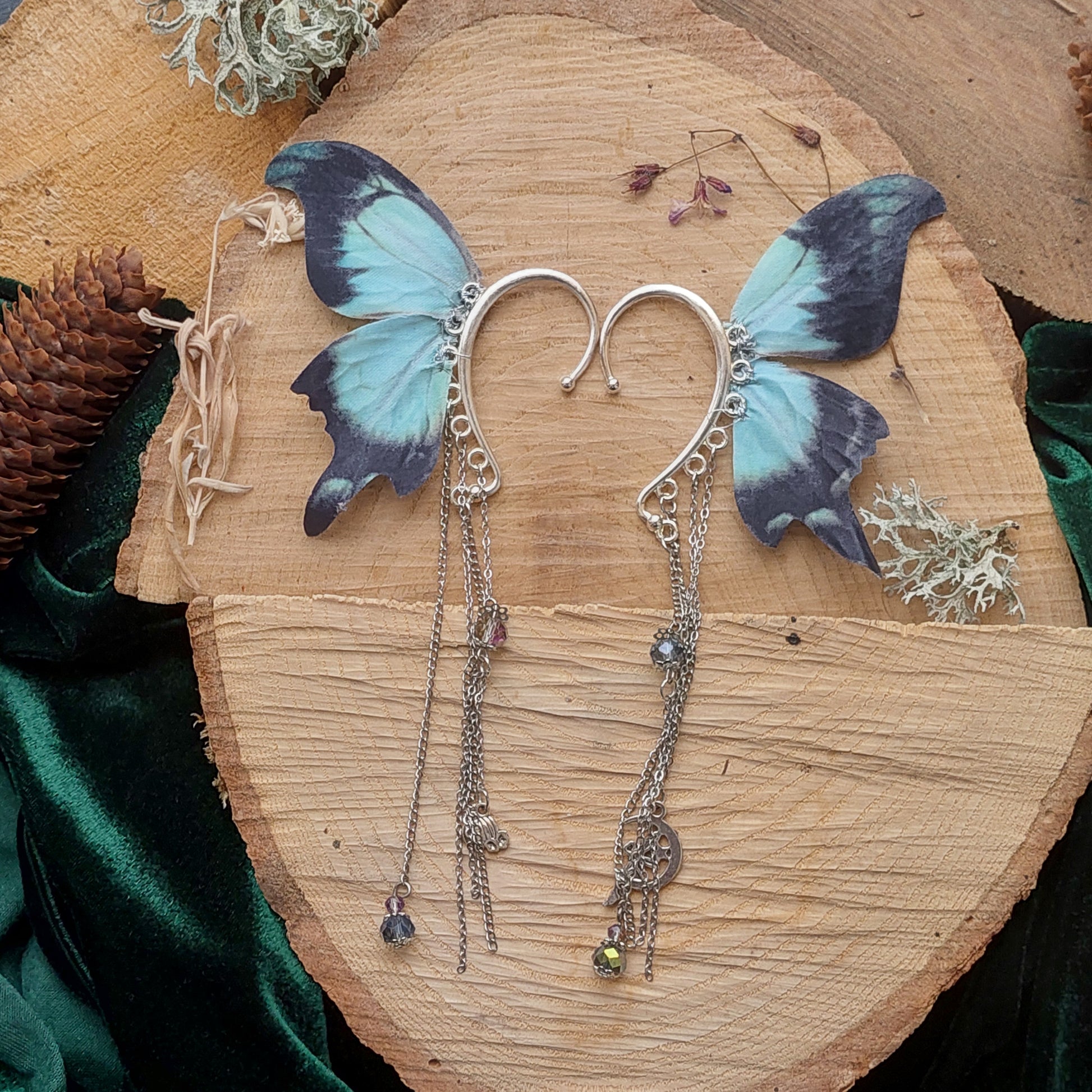 Dark fantasy moon moth elf ear cuff with silk wings - front view on model