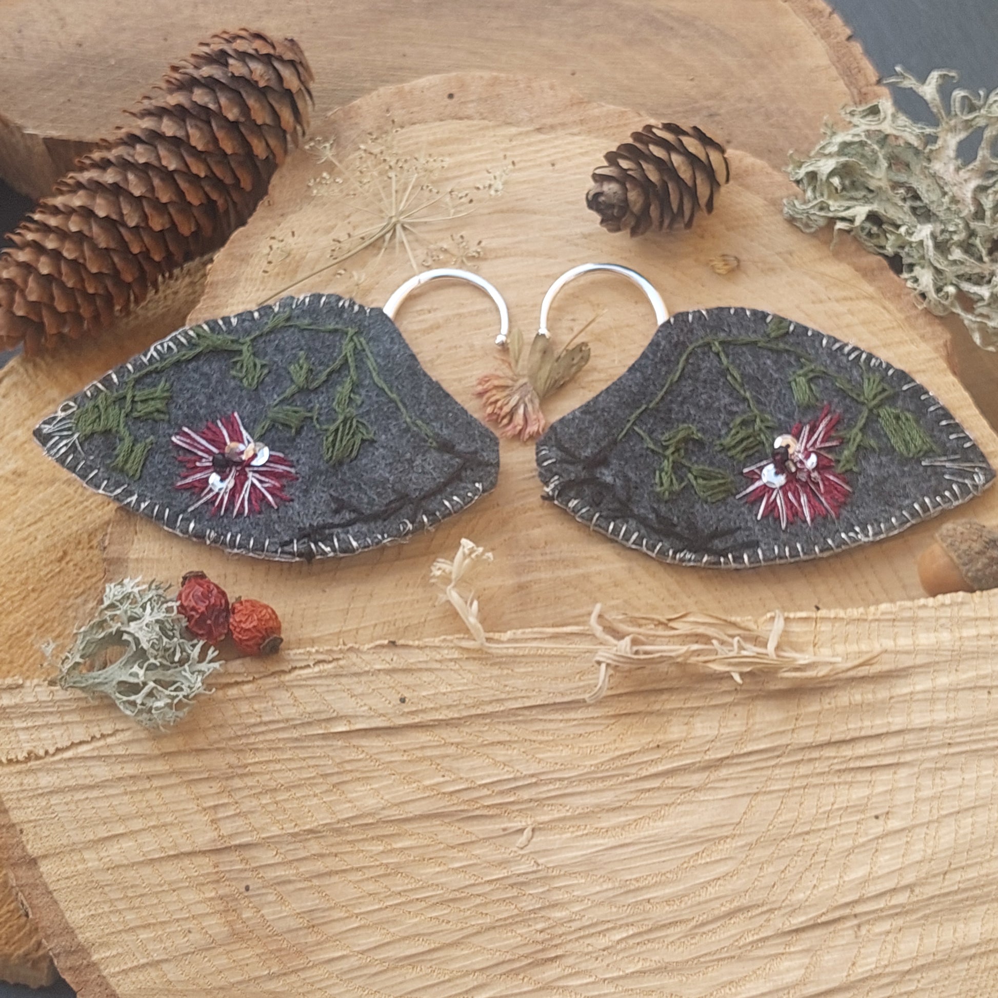 Hand embroidered dark fantasy elf ear cuffs inspired by forest botanics. Lightweight, no piercing, one of a kind fantasy jewelry.

