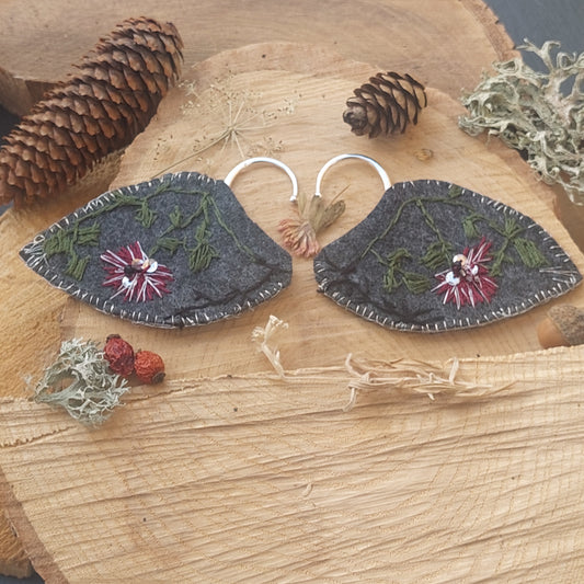 Hand embroidered dark fantasy elf ear cuffs inspired by forest botanics. Lightweight, no piercing, one of a kind fantasy jewelry.


