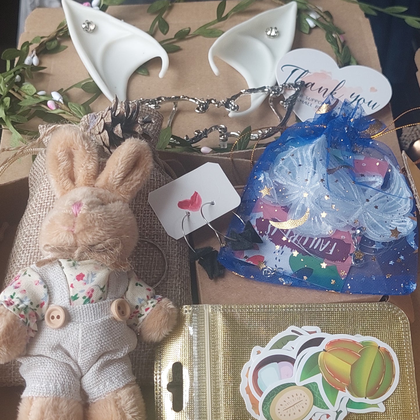 Magical fairy accessories and gothic jewelry in fantasy mystery box