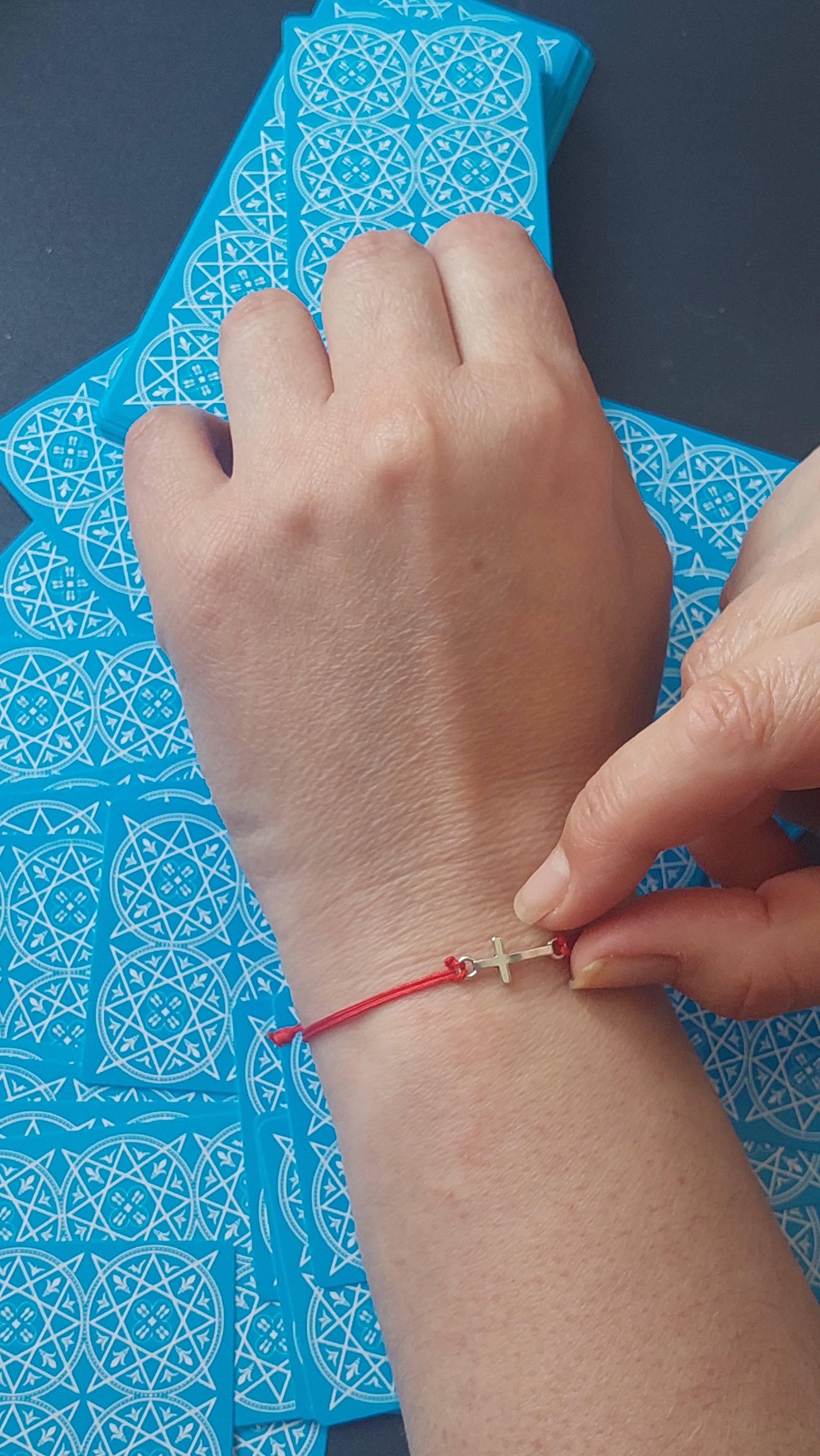 Red macrame cross bracelet – bold spiritual gothic jewelry handmade with waxed cord and silver charm
