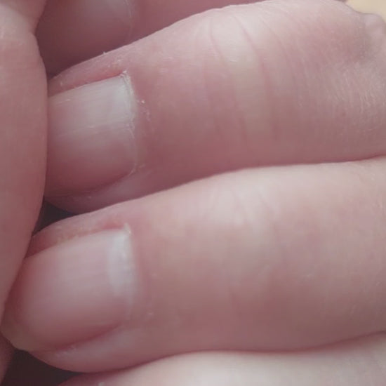 Hand embroidered gothic broken heart stud earrings. Minimalist stoic jewelry inspired by inner strength. Lightweight, symbolic, and unique. Shop now.