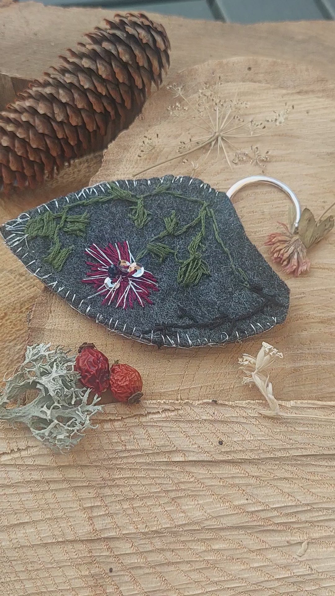 Hand-embroidered elf ear cuffs inspired by dark fantasy and forest botanics.