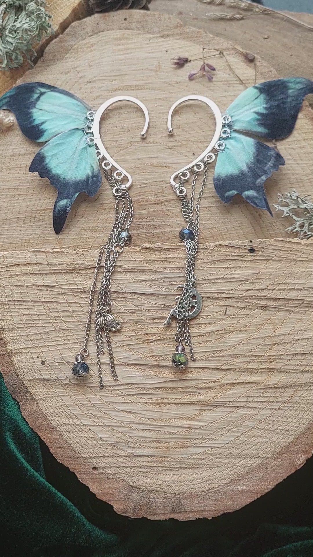 Dark fantasy moon moth ear cuff video - showing movement of chains and wings